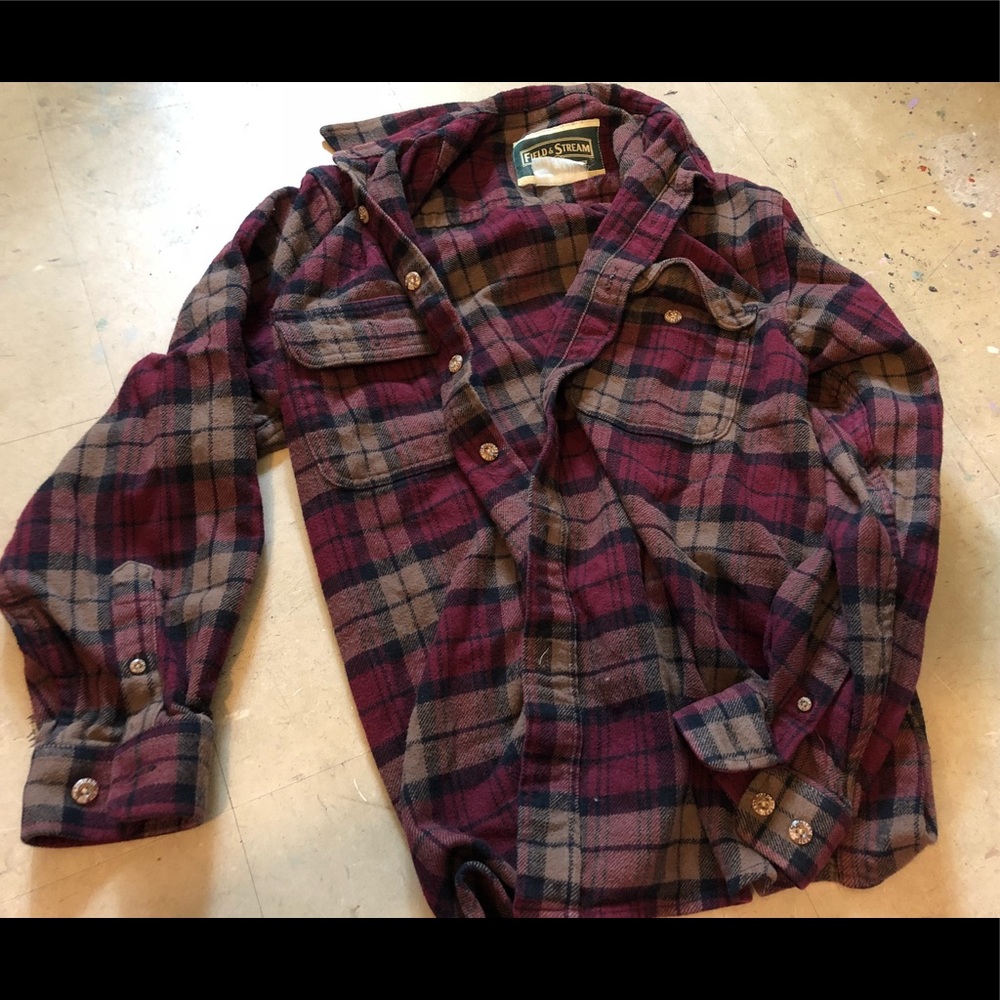 Plaid button up shirt.